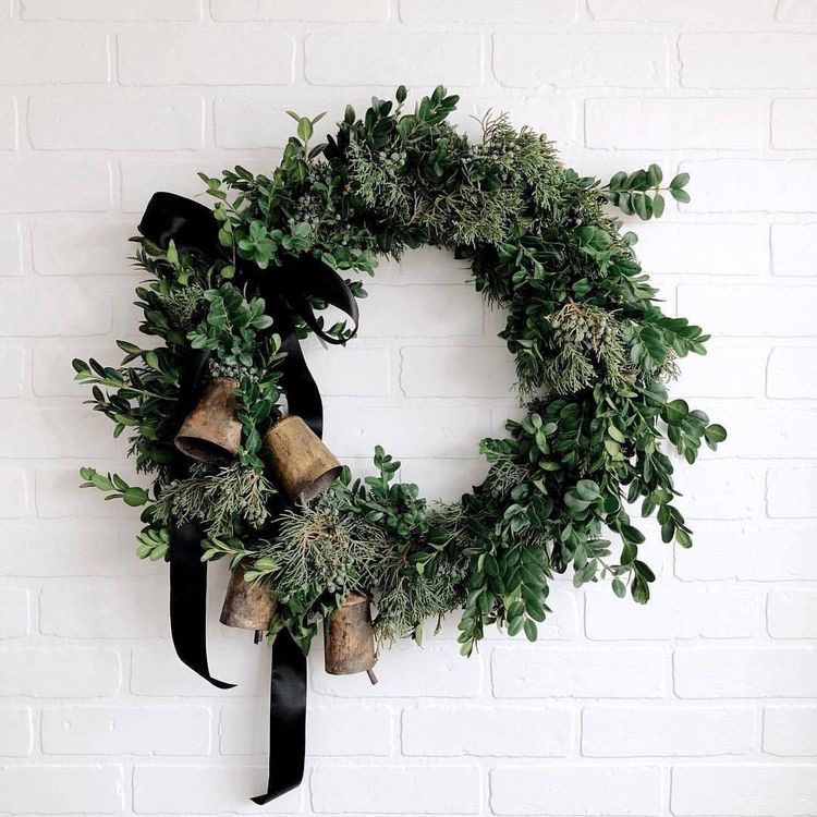 wreath with black bow and brass bells
