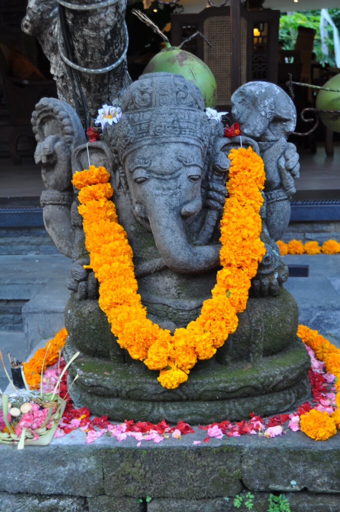 Hindu elephant statue with marigolds