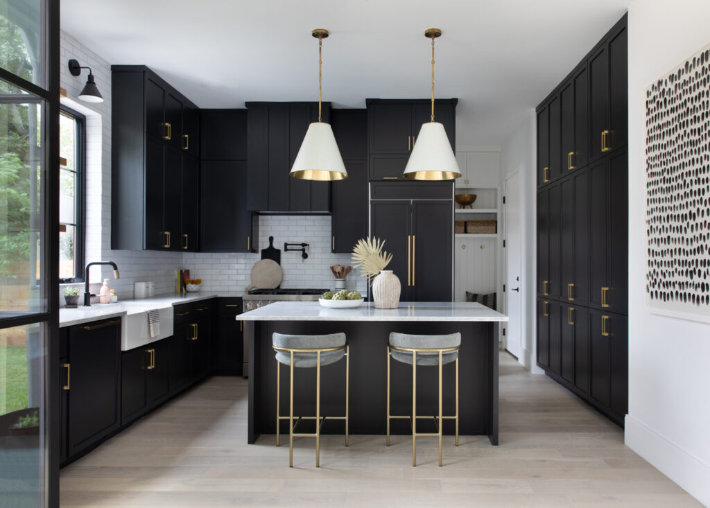 Urban Modern New Build Home in Austin Texas with a sleek black kitchen and brass accents