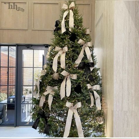 White bows on christmas tree